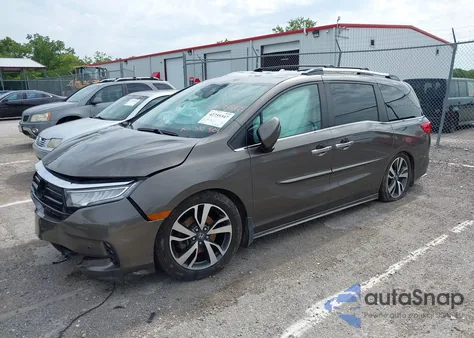 2021 Honda Odyssey Touring z USA, uszkodzony, nr VIN 5FNRL6H84MB002272